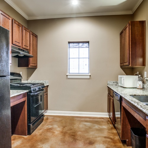 Spacious well lit lounge with large open area and ample seating